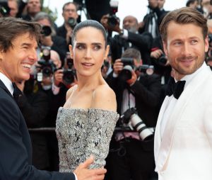 Tom Cruise, Jennifer Connelly et Glen Powell à l'avant-première de Top Gun : Maverick au festival de Cannes le 18 mai 2022