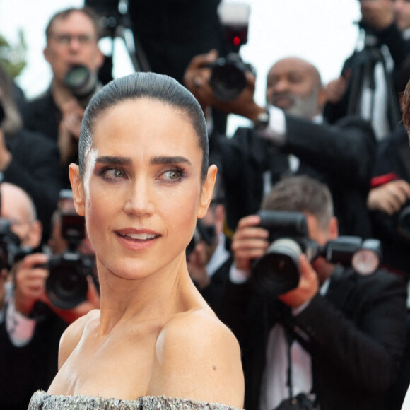 Tom Cruise, Jennifer Connelly et Glen Powell à l'avant-première de Top Gun : Maverick au festival de Cannes le 18 mai 2022