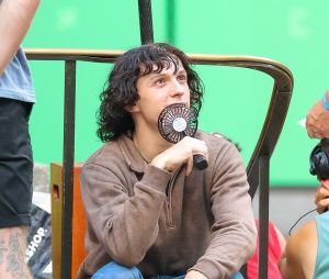 Tom Holland sur le tournage du film "The Crowded Room" à New York, le 2 août 2022. 