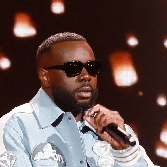 Exclusif - Gims chante son tube "Tu vas me manquer" lors de l'émission "Unis face au séisme" à l'Olympia diffusée en direct sur France 2 le 14 mars 2023. © Christophe Clovis/ Cyril Moreau / Bestimage