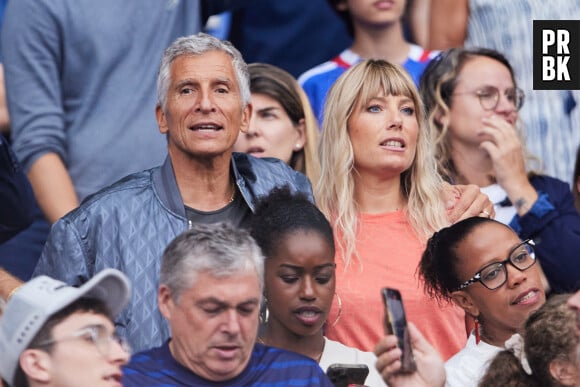 Nagui et sa femme Melanie Page - Célébrités dans les tribunes du match de football entre la France et la Grèce au Stade de France dans le cadre des éliminatoires pour l’Euro 2024, le 19 juin 2023. © Cyril Moreau/Bestimage