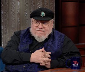George R.R. Martin sur le plateau de l'émission "The Late Show With Stephen Colbert" à New York. © JLPPA/Bestimage  Game of Thrones and House of the Dragon author George RR Martin wishes he could send dragons to the Kremlin should Russian leader Vladimir Putin ever use nuclear bombs.The 74-year-old fantasy writer made the comments at the end of a rare TV appearance.He appeared on the Stephen Colbert US talk show to discuss his new illustrated history of the Targaryen dynasty as featured in HBO’s House of the Dragon TV series.The House of the Dragon drama is set 200 years before the events of Games of Thrones and focuses on the civil war between Targaryen family factions.It is an abbreviated version of the original 300,000 word book Fire and Blood and features 150 original illustrations by artists from all over the world bringing the fantasy worlds of Westeros and beyond to life.One of the images Colbert focussed on was the Iron Throne , made from the weapons of defeated enemies.While the TV series shows it as a single seat, the illustration reveals it sitting at the top of a stairway flanked by many more captured arms.Colbert said:” I was not aware of this.“We all have an image in our head of the Iron Throne from the series on HBO Game of Thrones.Martin replied:” That is what it is supposed to look like.“A lot of the kings cut themselves on It and sometimes get infected so it is probably good that you don't have an iron seat here ! 