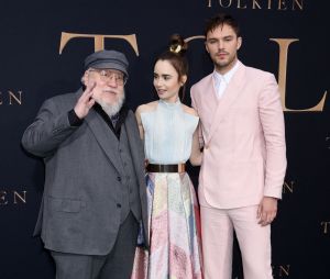 George R.R. Martin, Lily Collins and Nicholas Hoult at the &quot;Tolkien&quot; Los Angeles Premiere held at the Regency Village Theatre on May 8, 2019 in Westwood, Ca, USA. Photo by Janet Gough/AFF/ABACARESS.COM 