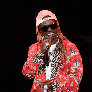 Et son influence est telle qu'il est régulièrement cité parmi les meilleurs rappeurs de tous les temps.
Lil Wayne en concert au Coral Sky Amphitheatre à West Palm Beach en Floride, le 25 juillet 2019.
