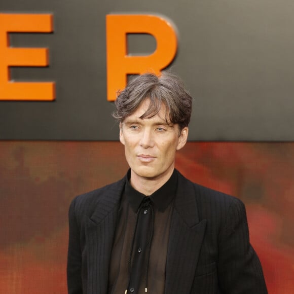 London, UNITED KINGDOM - Cast walk the 'charred' black carpet at tonight's premiere Pictured: Cillian Murphy 