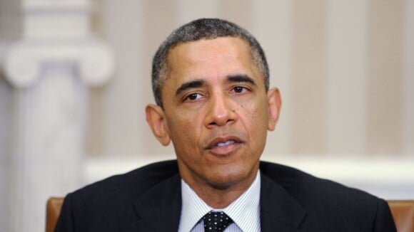 Barack Obama : un homme sort un pistolet pendant le passage de son cortège