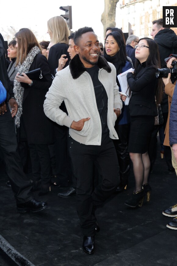 Kendrick Lamar au défilé Dior pendant la Fashion Week automne-hiver 2014-2015 à Paris, le 18 janvier 2014