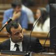 Oscar Pistorius lors de son proc&egrave;s pour meurtre, le 6 mars 2014, &agrave; Pretoria. 
