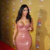 Kim Kardashian : robe ultra décolletée en latex, le 18 novembre 2014 à Melbourne