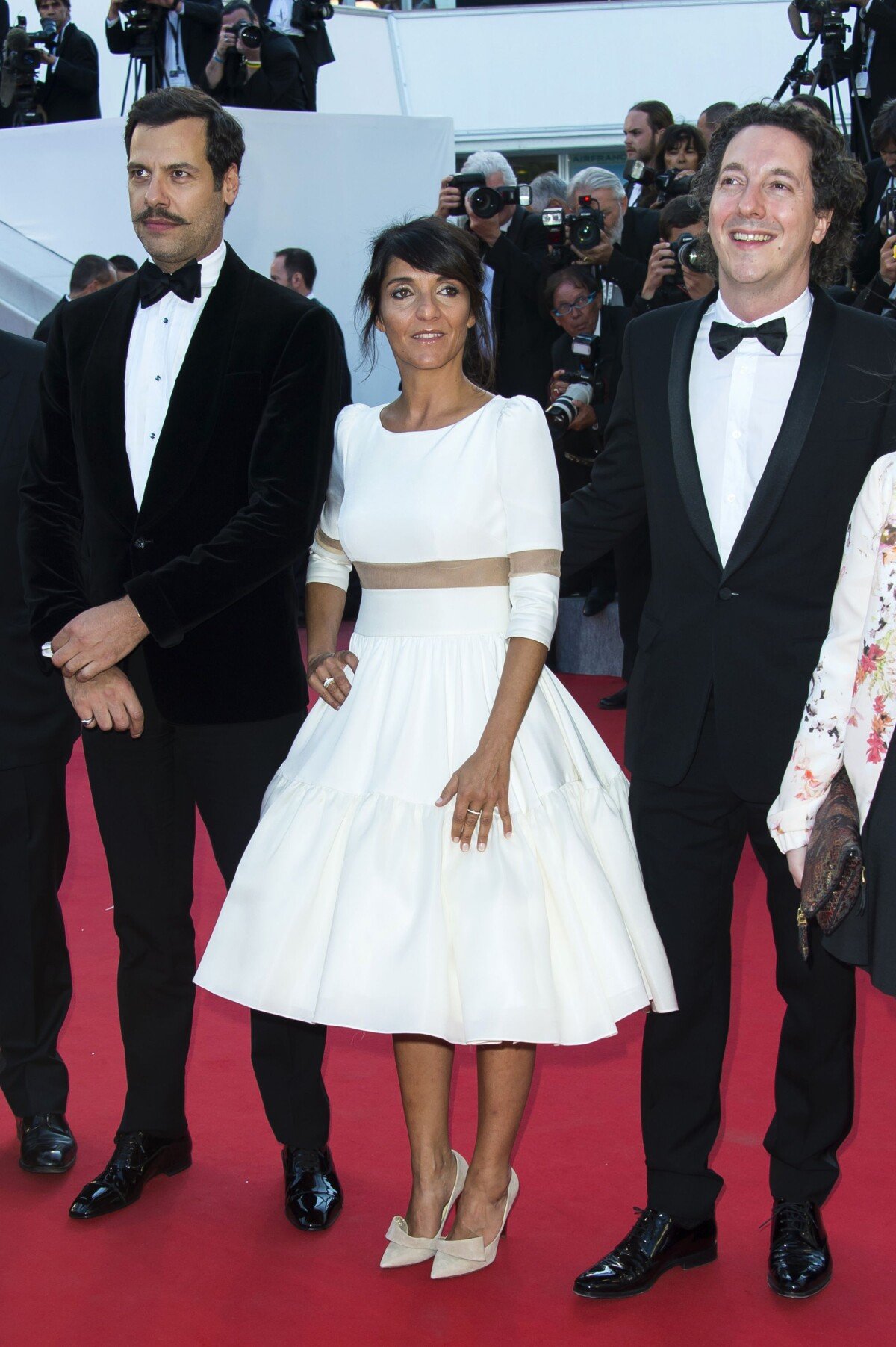 Photo Laurent Lafitte Florence Foresti et Guillaume Galienne sur le tapis rouge du Festival de Cannes 2015 avant la projection du film Le Petit Prince le 22 mai 2015 PureBreak