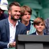 David Beckham et son fils Romeo assistent aux quarts de finale de Wimbledon, le 8 juillet 2015