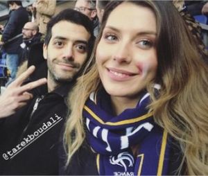 Tarek Boudali et Camille Cerf s'affichent ensemble lors du match France/Colombie le 23 mars