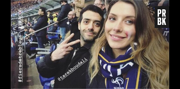 Tarek Boudali et Camille Cerf s'affichent ensemble lors du match France/Colombie le 23 mars
