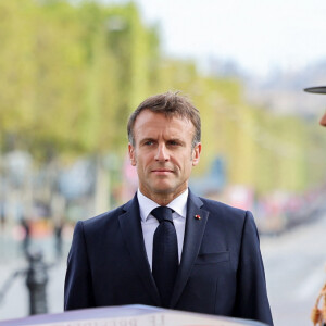 Le roi Charles III d'Angleterre et la reine consort Camilla Parker Bowles, le président français Emmanuel Macron et sa femme Brigitte Macron lors de la cérémonie du ravivage de la Flamme à l'Arc de Triomphe à Paris, le 20 septembre 2023. le couple royal britannique est en visite en France du 20 au 22 septembre 2023. 