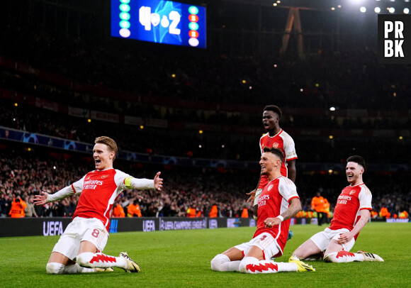 Arsenal's Martin Odegaard, Ben White, Bukayo Saka and Declan Rice celebrate after winning the penalty shoot-out of the UEFA Champions League Round of 16, second leg match at the Emirates Stadium, London. Picture date: Tuesday March 12, 2024. ... Arsenal v FC Porto - UEFA Champions League - Round of 16 - Second Leg - Emirates Stadium ... 12-03-2024 ... London ... UK ... Photo credit should read: Zac Goodwin/PA Wire. Unique Reference No. 75605158 ... See PA story SOCCER Arsenal. Photo credit should read: Zac Goodwin/PA Wire. RESTRICTIONS: Use subject to restrictions. Editorial use only, no commercial use without prior consent from rights holder. 