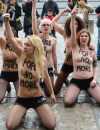 Des militantes Femen fêtent le départ de Benoît XVI à Paris