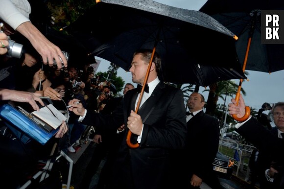 Leonardo DiCaprio sous la pluie pour la projection de Gatsby le Magnifique au Festival de Cannes 2013