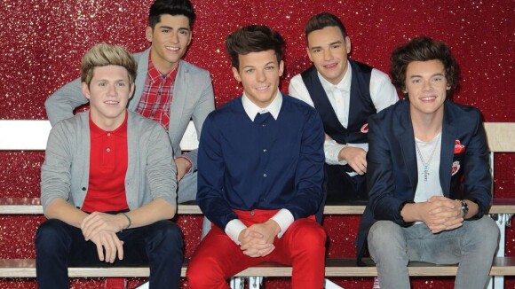 One Direction chez Madame Tussauds : un employé en charge de distribuer... des mouchoirs