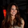 Kate Middleton souriante aux Tusk Conservation Awards le 12 septembre 2013 à Londres
