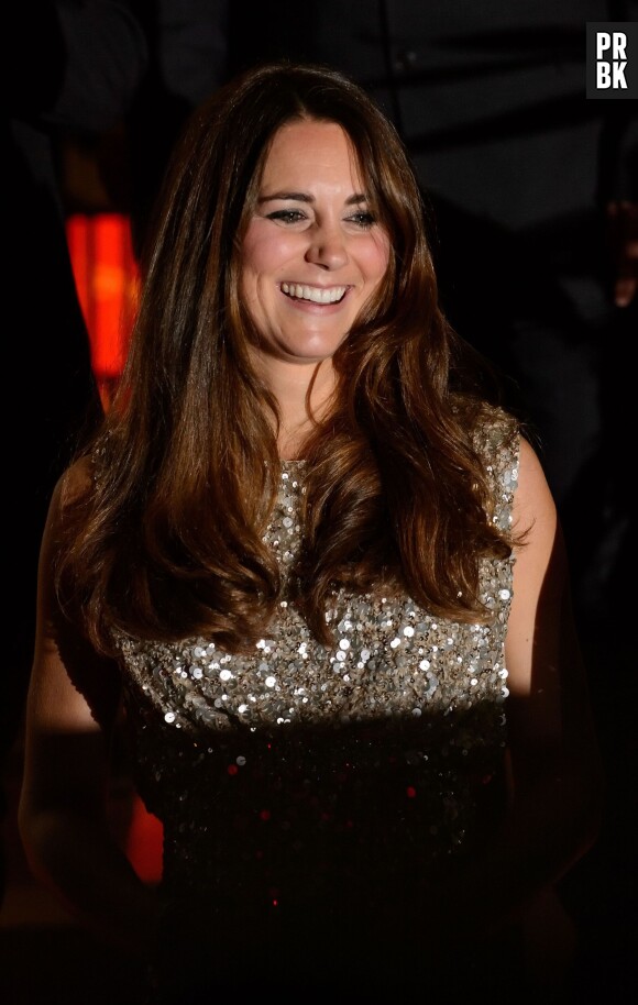 Kate Middleton souriante aux Tusk Conservation Awards le 12 septembre 2013 à Londres