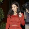 Kim Kardashian souriante pour une soirée à Beverly Hills, le 19 mars 2014