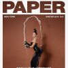 Kim Kardashian: fesses en arrière et coupe de champagne en Une du magazine Paper, hiver 2014