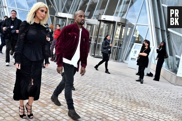 Kim Kardashian et Kanye West au défilé Louis Vuitton de la Fashion Week, le 11 mars 2015 à Paris