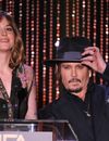 Dakota Johnson avec johnny Depp sur la scène des Hollywood Film Awards, le 1er novembre 2015