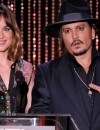 Dakota Johnson avec johnny Depp sur la scène des Hollywood Film Awards, le 1er novembre 2015