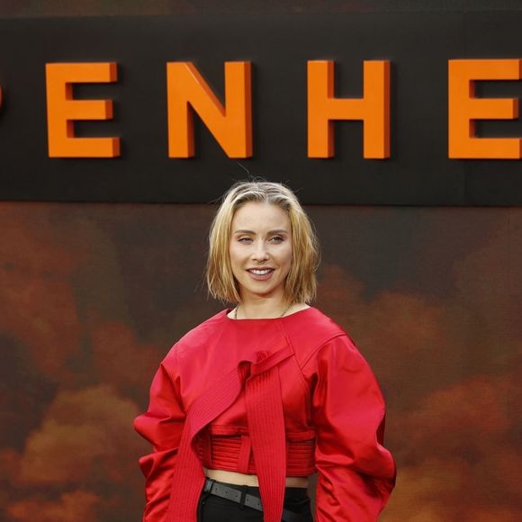 BGUK_2685708 - London, UNITED KINGDOM - Cast and guests walk along the 'charred' black carpet at the Oppenheimer Premiere in London. Pictured: Julia Hardy