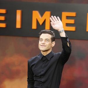 BGUK_2685708 - London, UNITED KINGDOM - Cast and guests walk along the 'charred' black carpet at the Oppenheimer Premiere in London. Pictured: Rami Malek