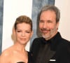Tanya Lapointe et Denis Villeneuve au photocall de la soirée "Vanity Fair" lors de la 95ème édition de la cérémonie des Oscars à Los Angeles, le 12 mars 2023. 