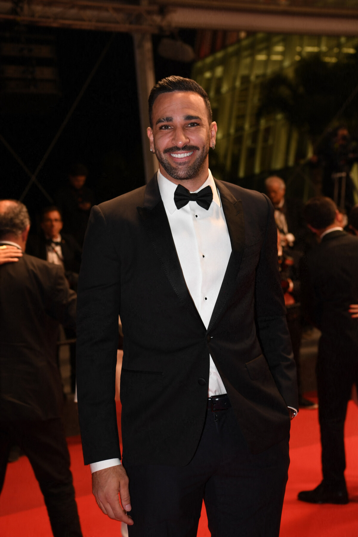 Photo : Adil Rami - Montée des marches du film 