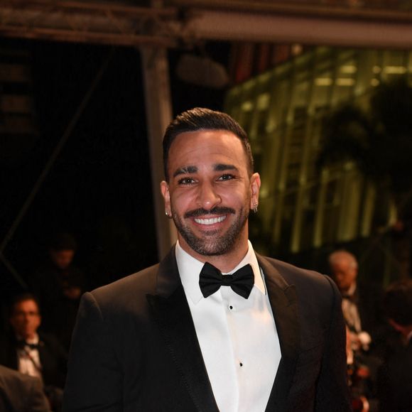 Adil Rami - Montée des marches du film "Novembre" lors du 75ème Festival International du Film de Cannes, le 22 mai 2022. © Rachid Bellak / Bestimage