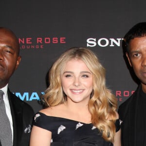 Antoine Fuqua, Chloë Moretz et Denzel Washington lors de la première du film "The Equalizer" à New York, le 22 septembre 2014.