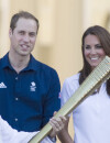 Kate Middleton, son Prince et la flamme olympique