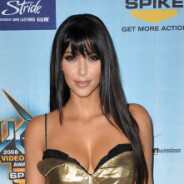 Kim Kardashian coquine : elle pince les fesses de Kanye West en public !
