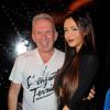 Nabilla Benattia : la bimbo a rencontré Catherine Deneuve au défilé de Jean-Paul Gautier, le samedi 28 septembre 2013