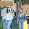 Kim Kardashian et Khloé Kardashian à Los Angeles, le 8 octobre 2013