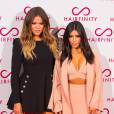 Khloe Kardashian et Kim Kardashian : duo sexy à la soirée Hairfinity, le 8 novembre 2014 à Londres