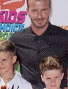 David Beckham et ses fils Romeo (à gauche) et Cruz (à droite)