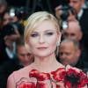 Kirsten Dunstsur le tapis rouge de la soirée d'ouverture du Festival de Cannes le 11 mai 2016
