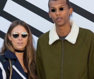 Stromae et sa femme Coralie à la Fashion Week parisienne.