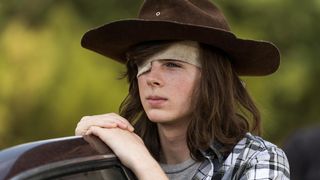 The Walking Dead saison 7 : Carl en danger de mort ? Chandler Riggs répond aux rumeurs