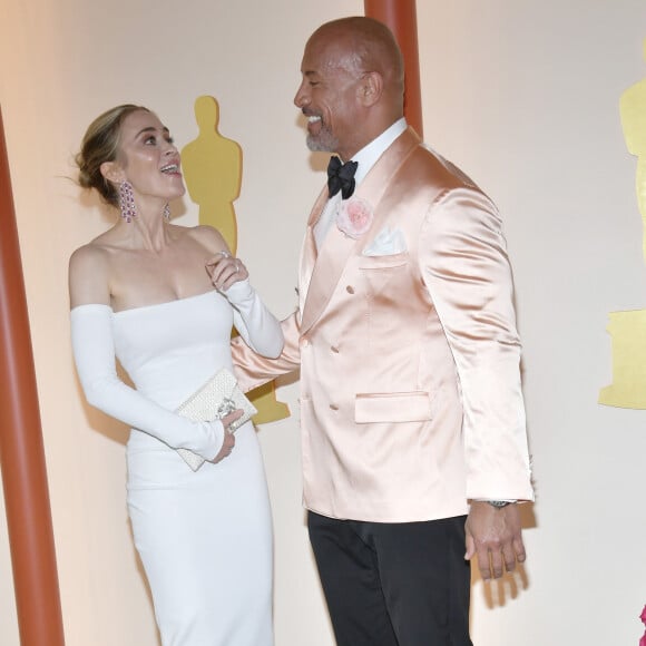 Emily Blunt et Dwayne 'The Rock' Johnson - Photocall de la 95ème édition de la cérémonie des Oscars à Los Angeles. Le 12 mars 2023  