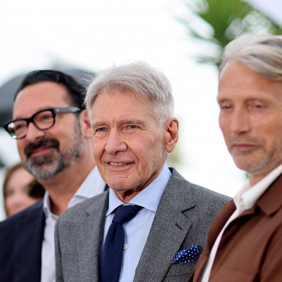 Le réalisateur James Mangold, Harrison Ford, Mads Mikkelsen au photocall de Indiana Jones et le cadran de la destinée " lors du 76ème Festival International du Film de Cannes, le 19 mai 2023. © Jacovides / Moreau / Bestimage