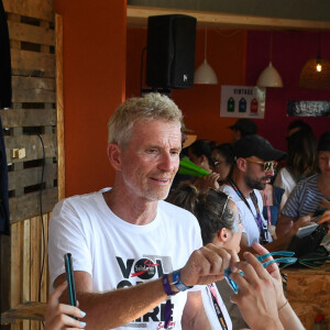 Denis Brogniart - Festival Solidays qui fête cette année ses 25 ans sur la pelouse de l'hippodrome de Longchamp à Paris le 25 juin 2023.