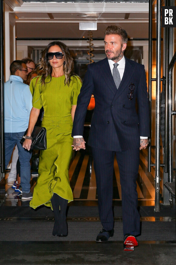 David et sa femme Victoria Beckham sont tirés à quatre épingles à la sortie de l’hôtel The Mark à New York City, New York, Etats-Unis, le 14 octobre 2022.