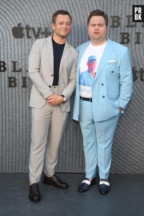 Taron Egerton, Paul Walter Hauser à la première de la série Apple TV+ "Black Bird" à Los Angeles, le 29 juin 2022.