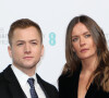 Taron Egerton et sa compagne Emily Thomas - Photocall - BAFTA Nominees Party au Kensington Palace à Londres, le 1er février 2020.